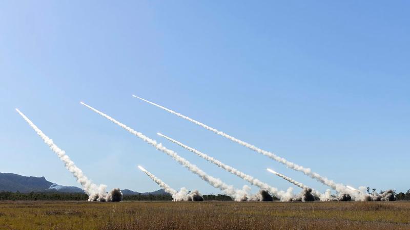 United States Marine Corps, Australian Army and Singapore Armed Forces artillery batteries fire their respective High Mobility Artillery Rocket Systems (HIMARS) during a live-fire training activity at Shoalwater Bay training area during Exercise Talisman Sabre 2025.