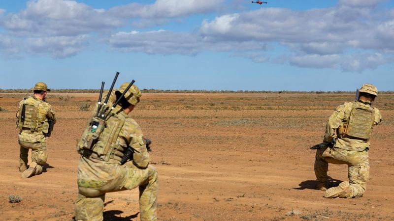 Australian Army soldiers conducting section attack procedures in a simulated Uncrewed Aerial Systems attack during an assessment at Cultana training area in 2025.