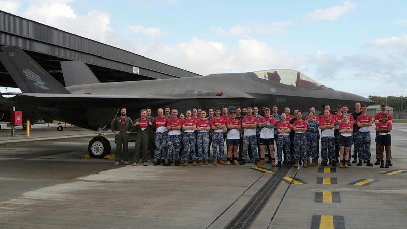 No 3 Squadron personnel who were part of the top fundraising team in this year’s March On, in front of a No 3 Squadron F-35A Lightning II aircraft at RAAF Base Williamtown, NSW.