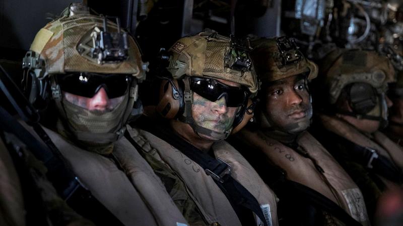 Australian Army soldiers onboard a United States Marine Corps V-22 Osprey insert into Aporawan, Palawan, Philippines, during Exercise Balikatan 2026.