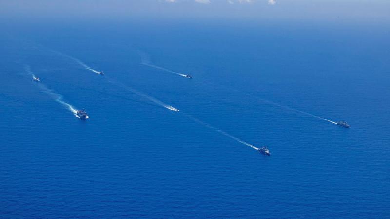 Ships sailing in the ocean.