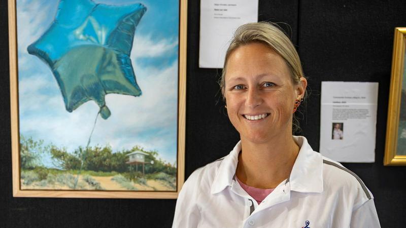 Australian Army officer Major Anneke Jamieson at the 2026 Defending the Arts exhibition at the Australian Defence Force Academy. 