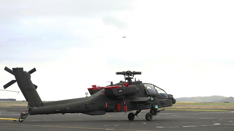 The Australian Army's fifth and sixth AH-64E Apache airframes being delivered to RAAF Townsville via RAAF C-17 Globemaster.