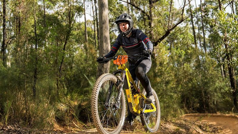 ADF Cyclist Captain Emma Milner negotiates a mountain bike track during the FOX Superflow mountain biking competition at Mogo, NSW.