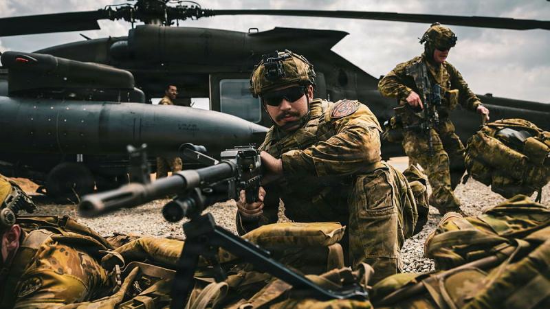 An Australian soldier provides security.