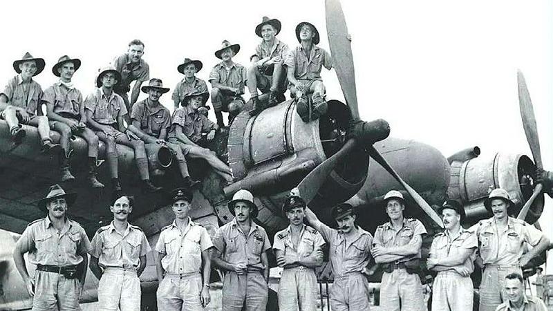 Pilots and observers of 31SQN on and in front of a Squadron Bristol Beaufighter. Photo: AWM / NWA0030