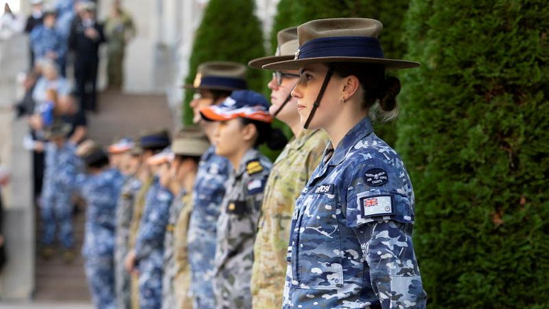 A row of military personnel.