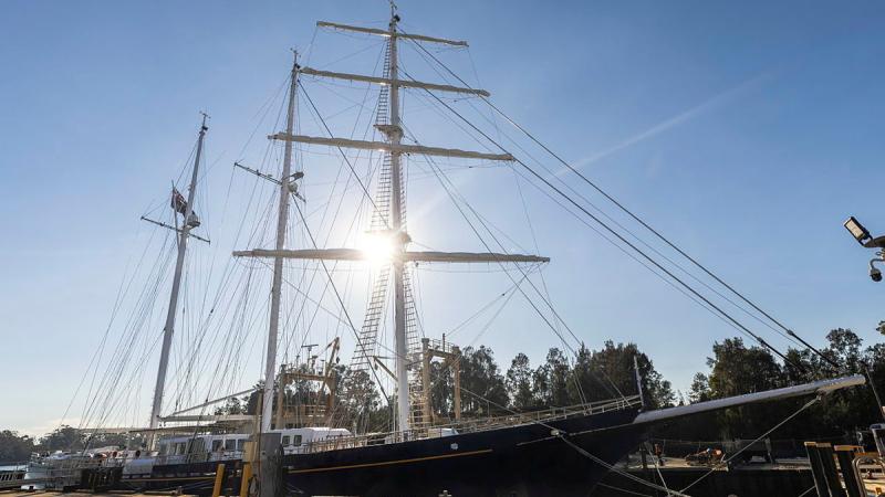 A ship at a dock.