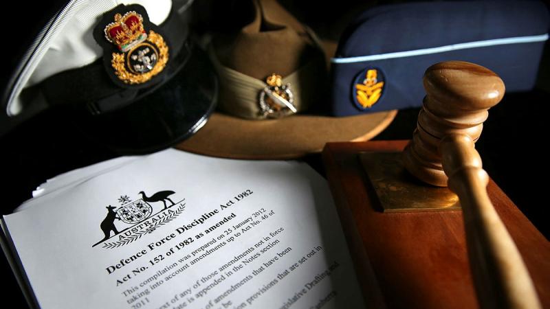 Hats from all three services, a gavel and political documents.