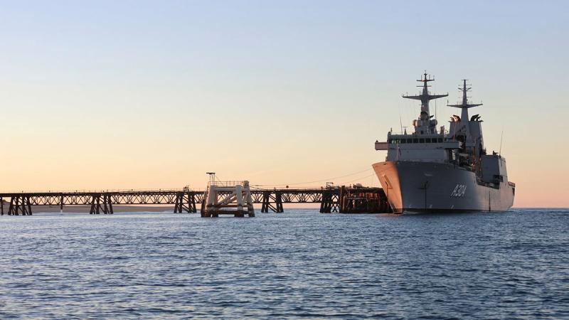 Royal Australian Navy replenishment oiler HMAS Stalwart conducted a fuel resupply mission to the Harold E Holt Defence Precinct in Exmouth, Western Australia, supporting the continued operation of one of Australia’s most important strategic communications facilities. The activity formed part of Defence's ongoing efforts to sustain critical infrastructure and maintain operational readiness across Australia's maritime approaches. Through the delivery of fuel and support services, HMAS Stalwart demonstrated