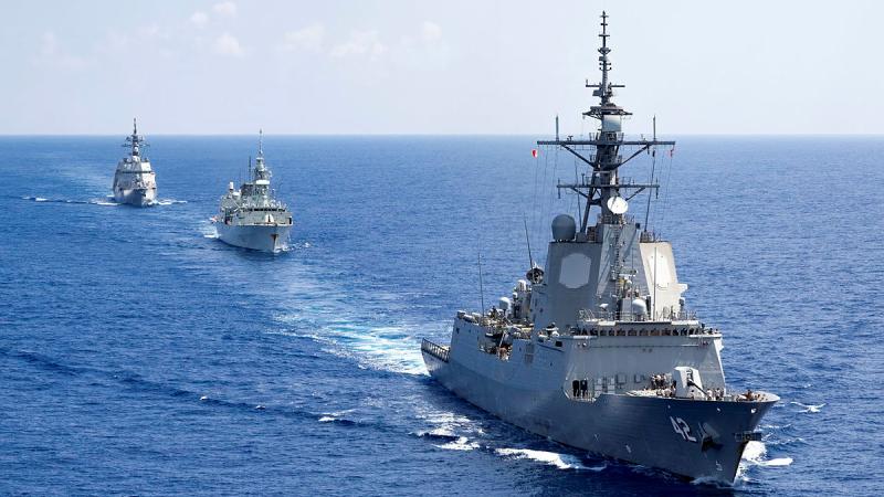Three ships sail in a row.
