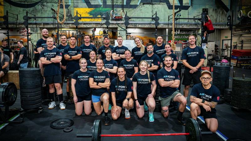 A group of Air Force men and women in a gym.
