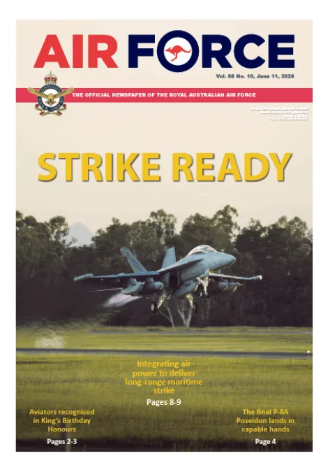 Air Force newspaper cover featuring a military fighter jet taking off over a grassy airfield, with the headline “STRIKE READY.”