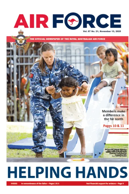Cover of Air Force newspaper showing an Air Force member assisting a child on a playground, with the headline “HELPING HANDS.” Story highlights community support in northern Australia.