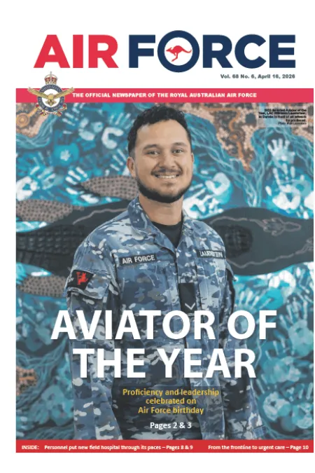 Air Force newspaper cover featuring a uniformed aviator standing before a blue Indigenous artwork mural, with the headline “AVIATOR OF THE YEAR.”