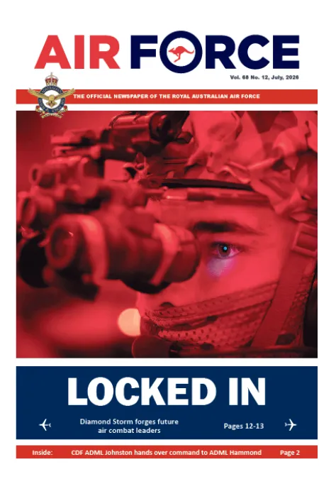 Cover of AIR FORCE, the official newspaper of the Royal Australian Air Force (Vol. 68 No. 12, July 2026). A red-tinted close-up photograph shows a military service member looking through night-vision equipment, with one eye visible in sharp focus. Large headline at the bottom reads “LOCKED IN,” with the subheadline “Diamond Storm forges future air combat leaders” and “Pages 12–13.” Additional text includes “CDF ADML Johnston hands over command to ADML Hammond” on page 2. The Royal Australian Air Force crest