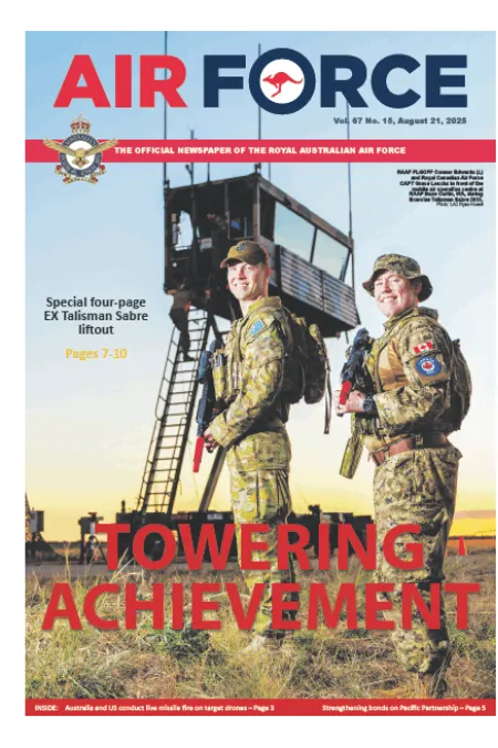 Cover of Air Force newspaper showing two military personnel standing with rifles near a training tower, with the headline “TOWERING ACHIEVEMENT.” Story highlights Exercise Talisman Sabre.