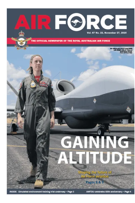 Cover of Air Force newspaper showing an Air Force aviator walking beside a large aircraft, with the headline “GAINING ALTITUDE.” Story focuses on shaping the future of Air Force aviation.