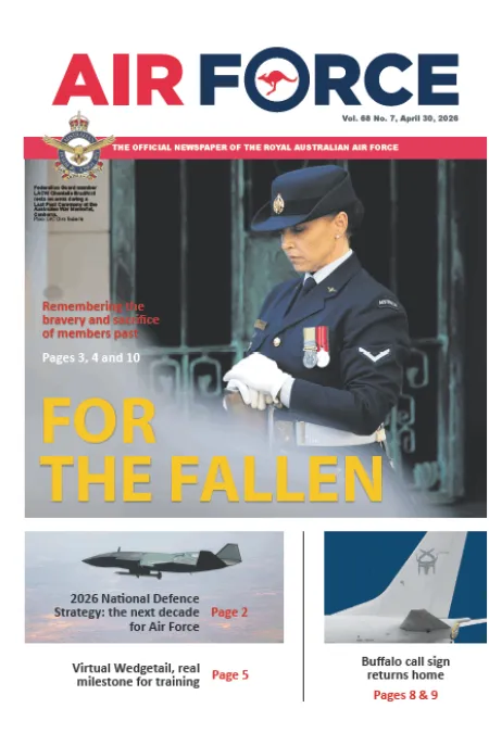 Air Force newspaper cover showing a uniformed service member at a remembrance ceremony, with the headline “FOR THE FALLEN.”