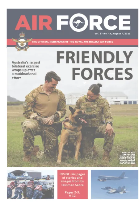 Cover of Air Force newspaper showing two military personnel kneeling beside a military working dog, with the headline “FRIENDLY FORCES.” Story highlights Exercise Talisman Sabre and multinational cooperation.