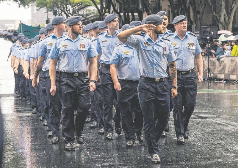 Air Force personnel marching.