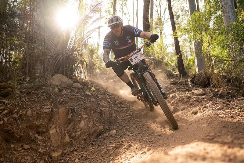 ADF Cyclist Major Brett Postlethwaite negotiates a mountain bike track during the FOX Superflow mountain biking competition at Mogo, NSW.
