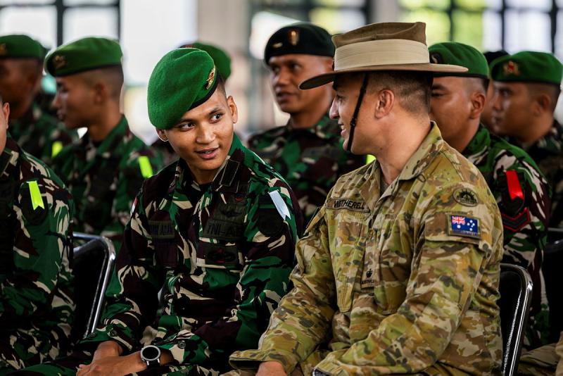 Australian Army officer Major Christopher Wetherell and an officer from the Tentara Nasional Indonesia during the opening ceremony of the Junior Officers Combat Instructor Training in Bandung, Indonesia. 