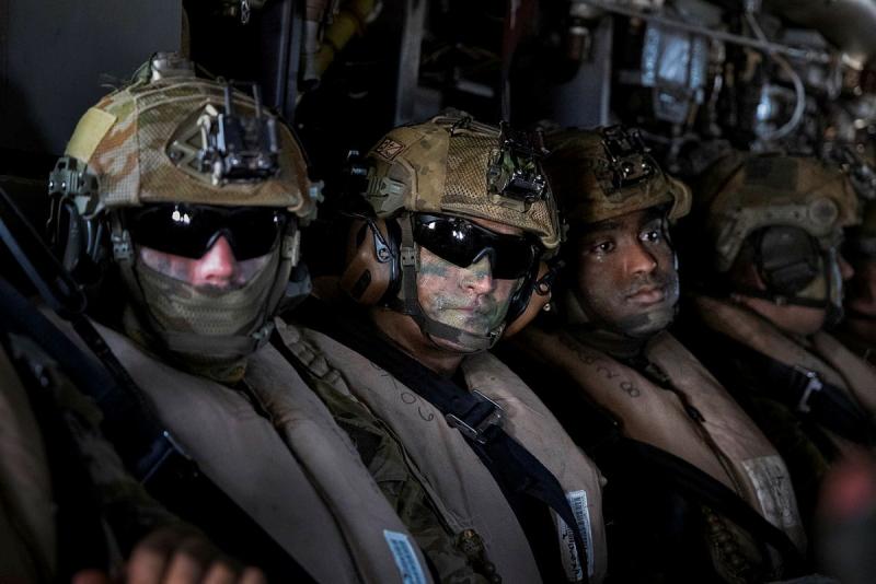Australian Army soldiers onboard a United States Marine Corps V-22 Osprey insert into Aporawan, Palawan, Philippines, during Exercise Balikatan 2026.