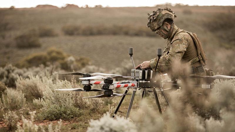 Australian Army soldier, Craftsman Jeremy Tjong, 1st Armoured Regiment, prepares the Callisto 50 heavy-lift uncrewed aerial system at Cultana Training Area during Exercise Black Prince 3.