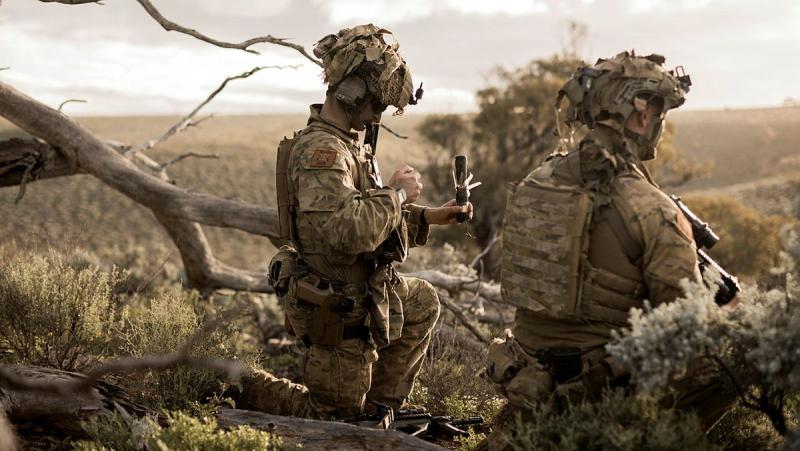 Australian Army soldiers Trooper Clayton Edmonds and Lance Corporal Ayden Harris-Boulton, 1st Armoured Regiment, prepare to launch a D-40 uncrewed aerial vehicle at the Cultana Training Area, during Exercise Black Prince 3.