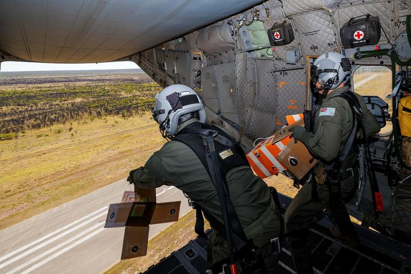 Loadmasters from 35 Squadron conduct helibox drops from a C-27J Spartan over the Northern Territory.