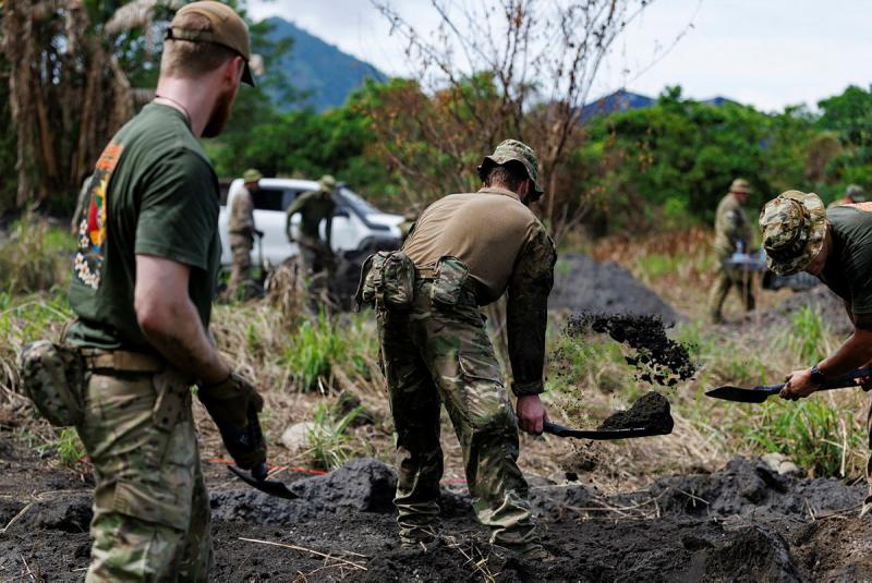 Members of the New Zealand Defence Force prepare pits to dispose of unexploded ordnance on Operation Render Safe in Rabaul, Papua New Guinea.