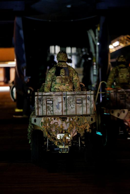 Combat Controllers from 4 Squadron load onto a 37 Squadron C-130J Hercules during Exercise Diamond Storm at RAAF Base Darwin. 