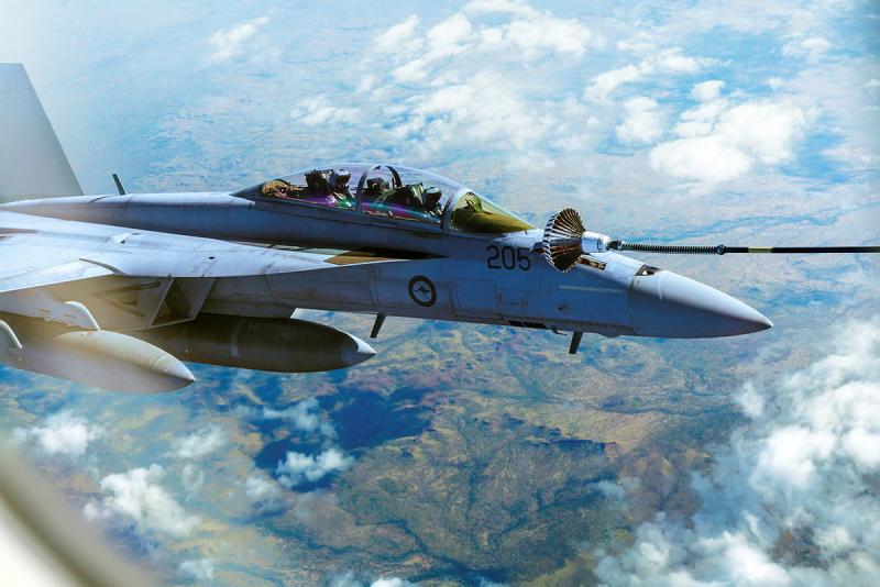 A 1 Squadron F/A-18F Super Hornet refuels from a 33 Squadron KC-30A Multi-Role Tanker Transport during Exercise Diamond Storm, over the Northern Territory.