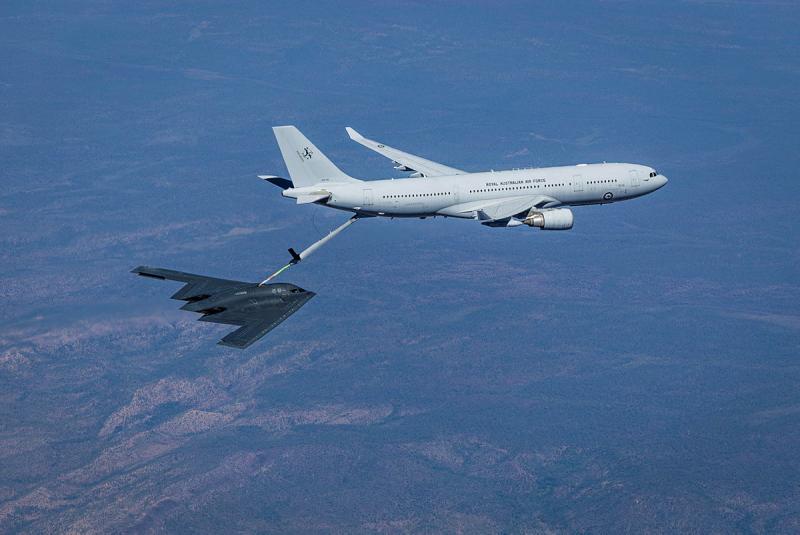 A 33 Squadron KC-30A Multi-Role Tanker Transport conducts refueling serial with a United States Air Force B-2 Spirit during Exercise Diamond Storm, over the Northern Territory.