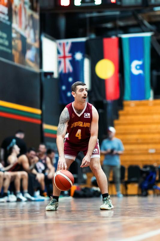 ADF Basketballer Army Lieutenant Luke Meilak sets out defence during the 2026 Battle of the Badges against Queensland Fire Department on June 20.