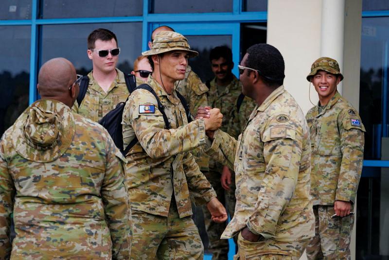 Contingent members prepare to leave Tokua Airport on a RAAF C-130J Hercules following the wrap up of Operation Render Safe in East New Britain, PNG. Photo: Sgt Andrew Sleeman