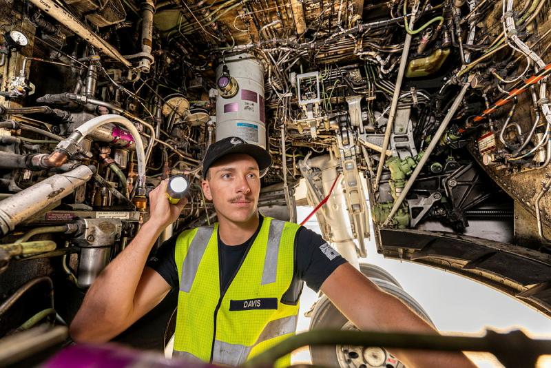 Aircraftman Kye Davis, an Aviation Support Technician from No. 2 Squadron, conducts pre-flight inspections on an E-7A Wedgetail before a mission supporting Exercise Diamond Storm at RAAF Base Darwin, Northern Territory