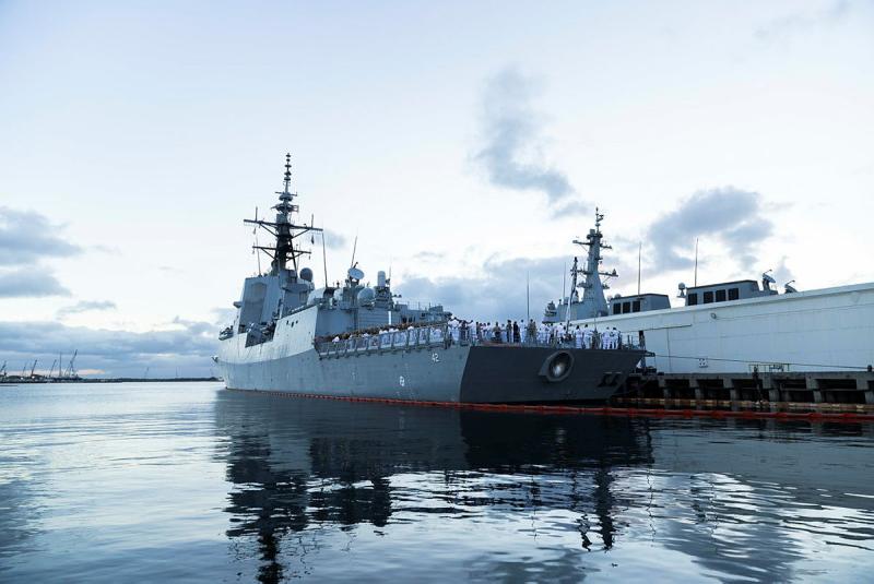 A ship docked at a harbour.