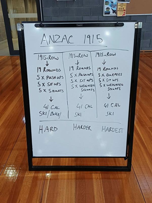 Personnel at RAAF Base East Sale participate in a commemorative Workout of the Day.