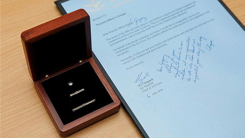 A medal and an award.