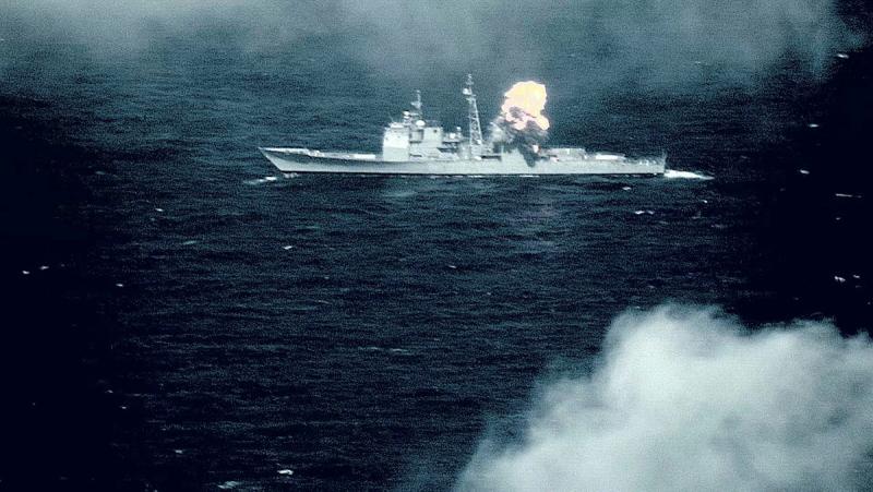 An explosion aboard a ship at sea.