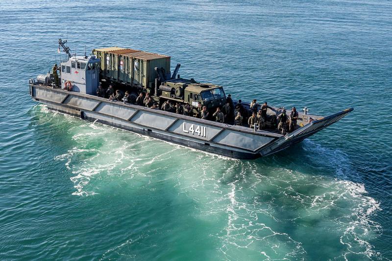 An LHD Landing Craft from HMAS Canberra transports Marine Rotational Force - Darwin personnel and vehicles ashore. 