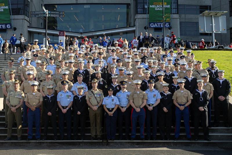 A large group of military personnel in a standing formation.
