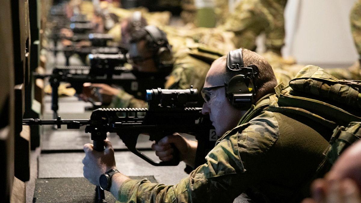 Australian Army officer Captain Harrison Keynes from the 17th Sustainment Brigade undertakes Combat Marksmanship Continuum (CMC) at the Weapon Training Simulation System (WTSS) facility at Holsworthy Barracks.