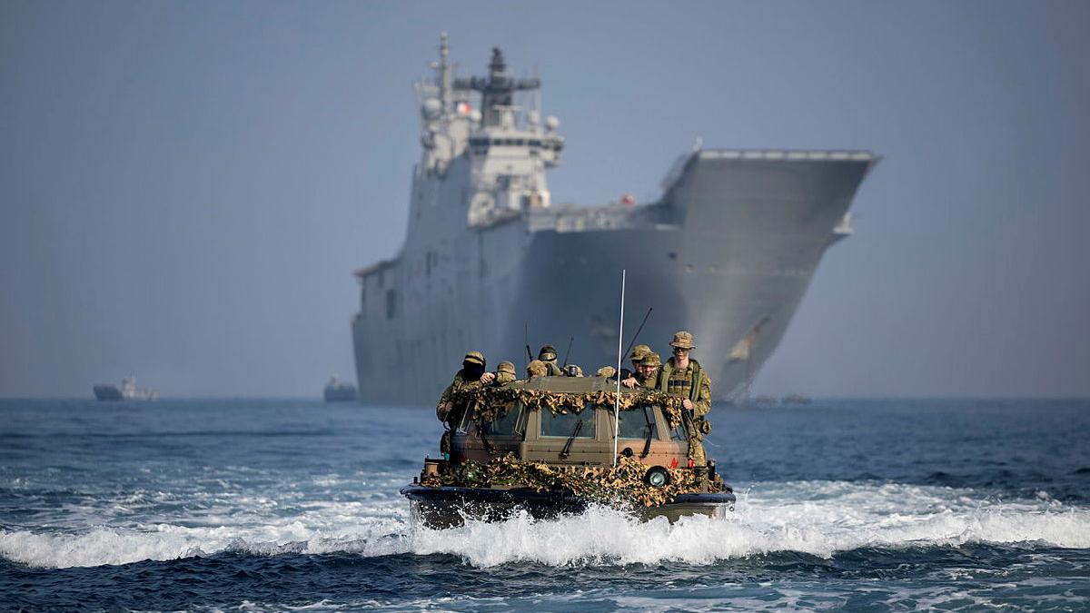 Australian Army Light Amphibious Resupply Craft transports soldiers from HMAS Adelaide to the beach during Exercise Keris Woomera 2024, in Indonesia.