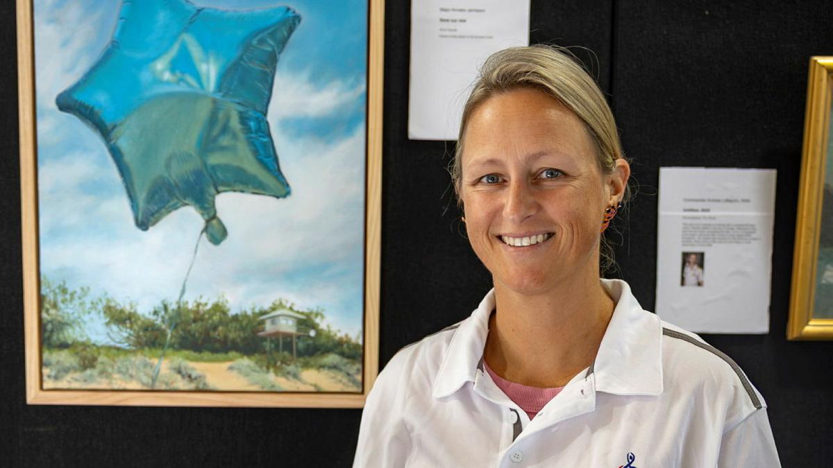 Australian Army officer Major Anneke Jamieson at the 2026 Defending the Arts exhibition at the Australian Defence Force Academy. 