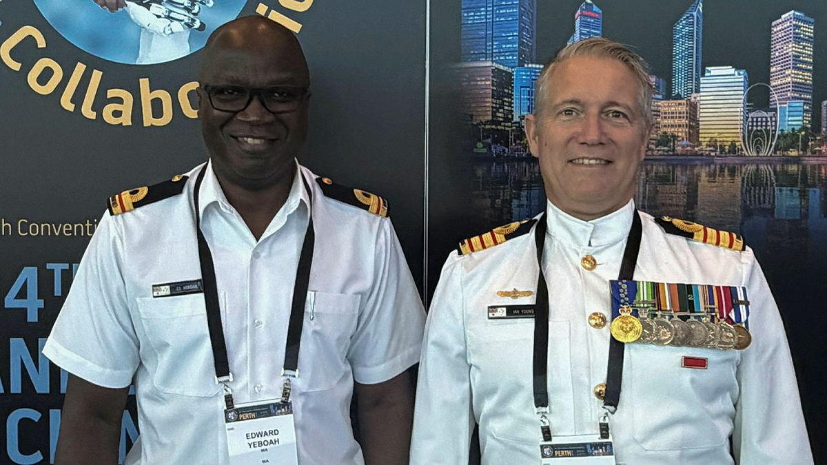 Royal Australian Navy officers Lieutenant Edward Young and Captain Ian Young at the 94th Royal Australasian College of Surgeons Annual Scientific Congress.