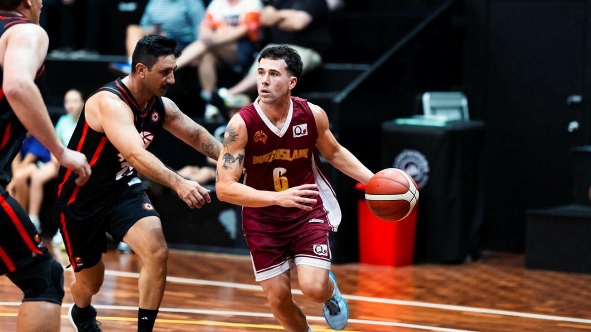 Men play against each other in basketball.