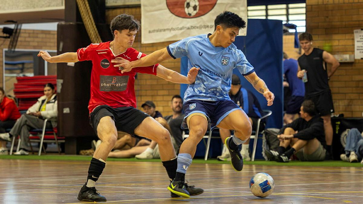 Army and Air Force personnel compete during the ADF Futsal Federation Championships at Randwick Barracks.